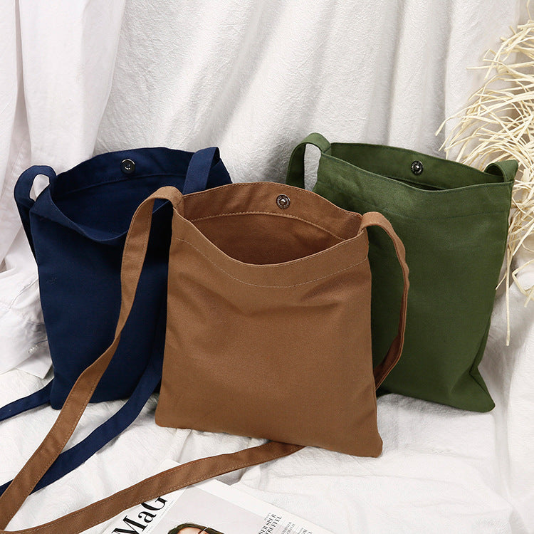 Sacs messagers en toile de couleur économique en gros avec bretelles