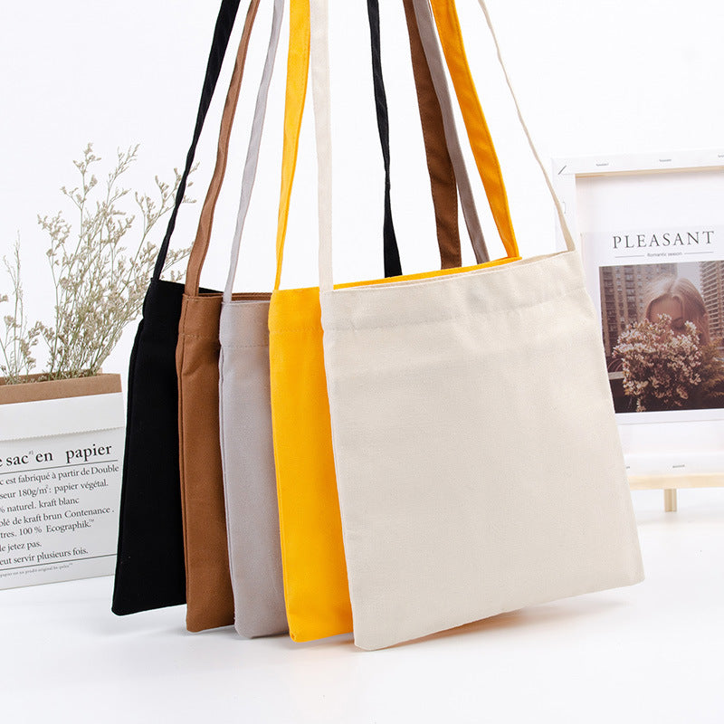 Sacs messagers en toile de couleur économique en gros avec bretelles